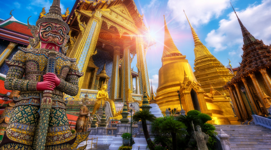 Travel concept, Giant statue at Temple Wat Pra Kaew, Grand Palace Bangkok