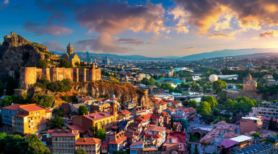 Panoramic of Tbilisi city at sunrise in Georgia.