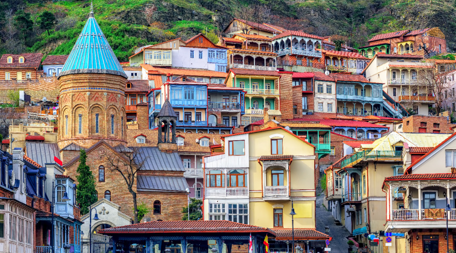 Colorful traditional houses with wooden carved balconies in the Old Town of Tbilisi, Georgia